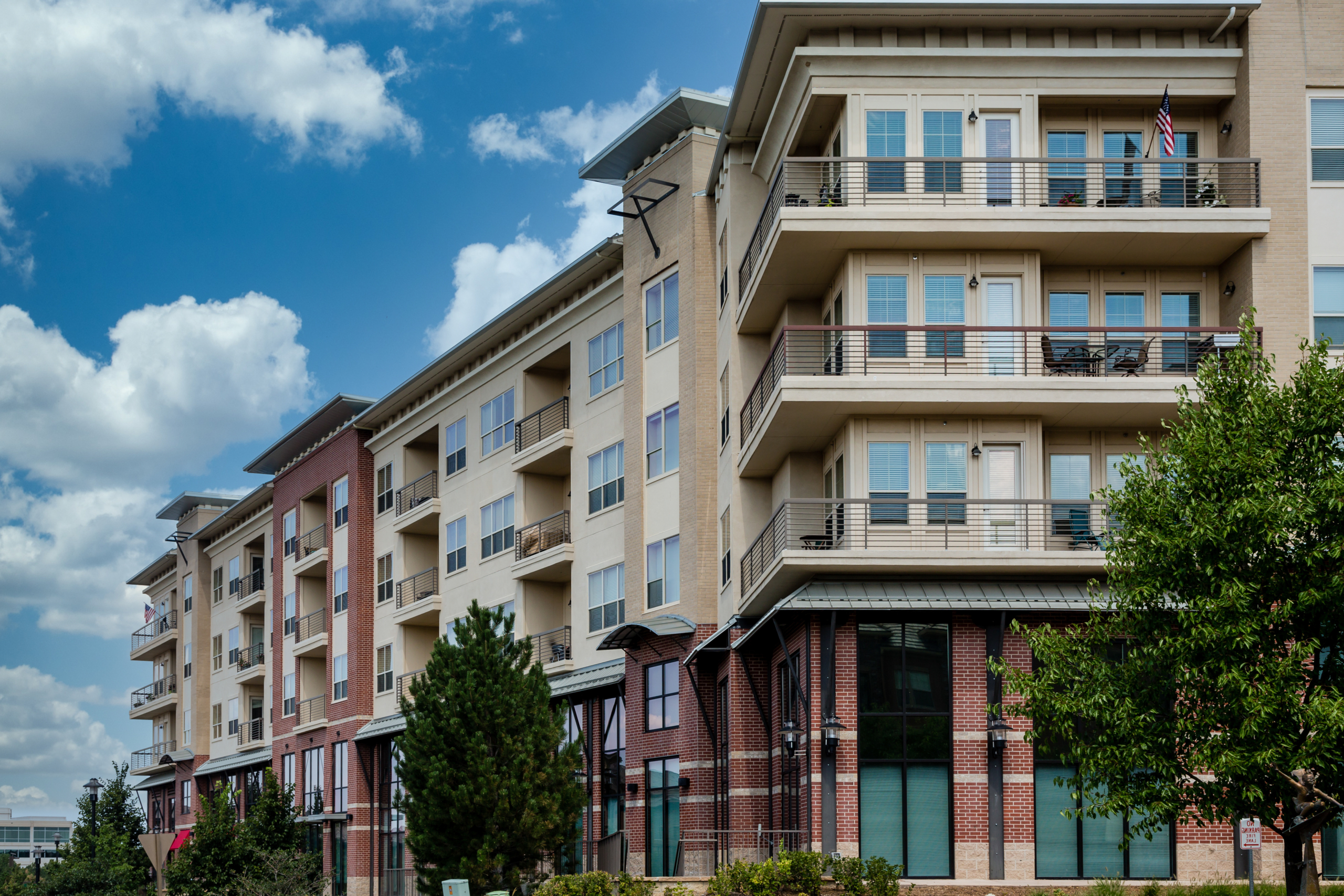 Brick and Plaster Condos with Balconies