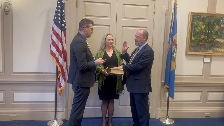 Director Matthew Heckles being confirmed by Governor Matt Meyer.