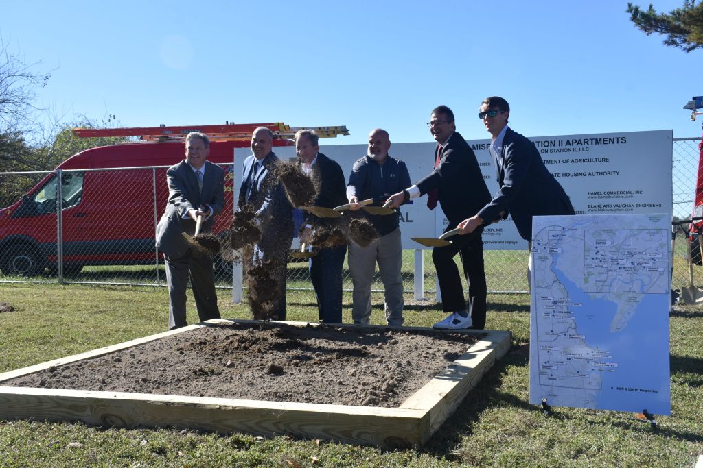 Governor Meyer and DSHA Director Heckles join other housing leaders to throw dirt in celebration of the groundbreaking